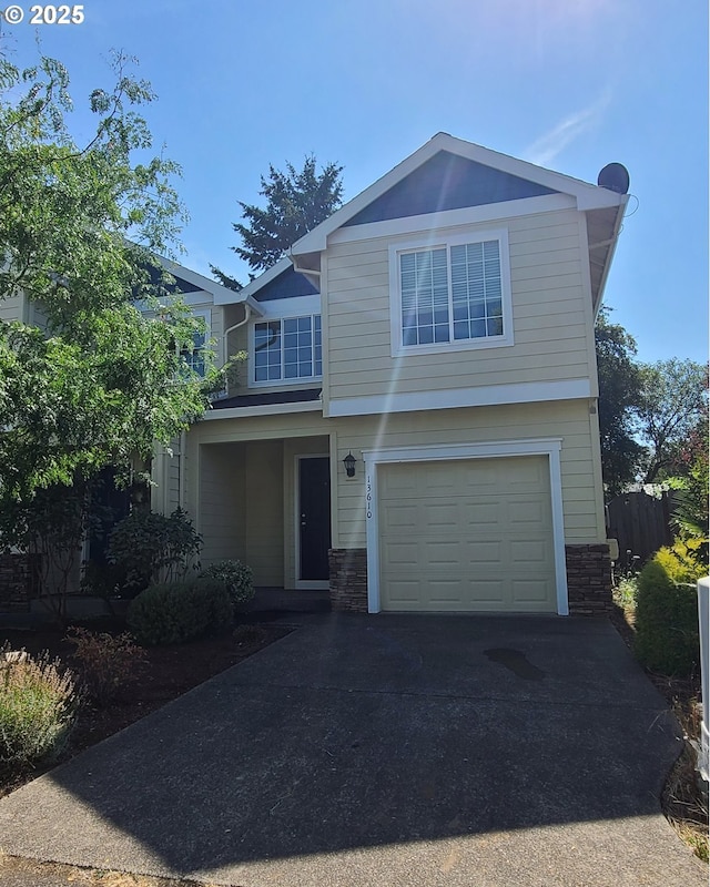 view of front of property featuring a garage