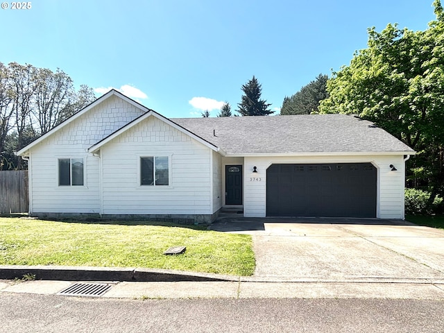 3743 Chicago St NE, Keizer, OR 97303 - ranch-style house with a garage, concrete driveway, and a front yard