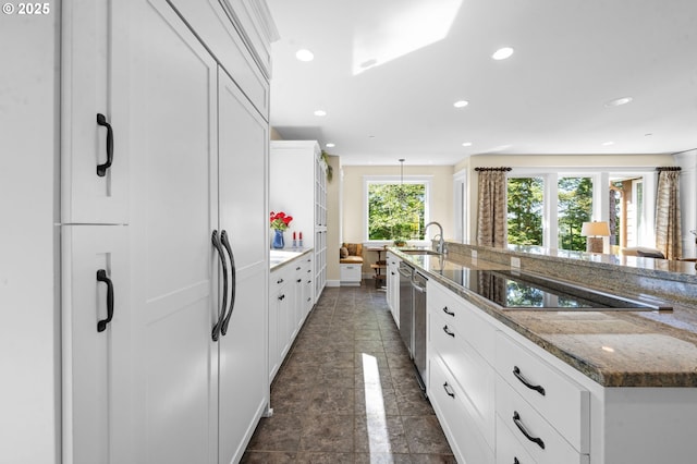 33525 Beerman Creek Ln, Seaside, OR 97138 - kitchen with a sink, recessed lighting, black electric cooktop, white cabinetry, and dishwasher