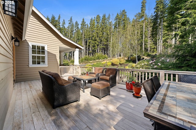 33525 Beerman Creek Ln, Seaside, OR 97138 - wooden deck with an outdoor living space and a wooded view