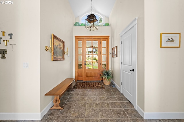 33525 Beerman Creek Ln, Seaside, OR 97138 - doorway featuring baseboards and vaulted ceiling