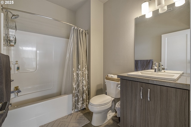 bathroom with shower / bath combo with shower curtain, wood finished floors, toilet, and vanity