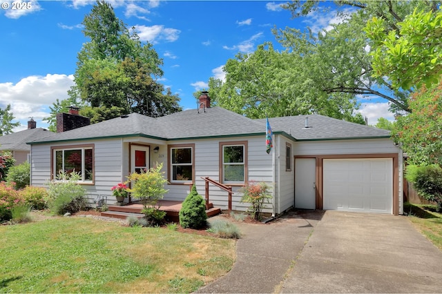 2674 Kincaid St, Eugene, OR 97405 - view of front of property featuring driveway, an attached garage, a chimney, a front lawn, and roof with shingles