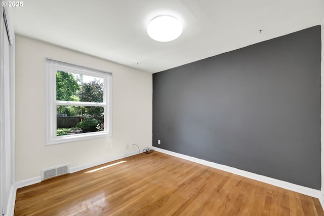 2674 Kincaid St, Eugene, OR 97405 - spare room featuring baseboards and wood finished floors