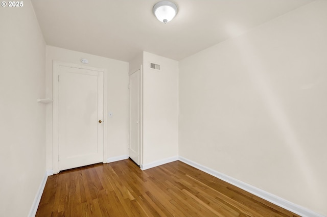 2674 Kincaid St, Eugene, OR 97405 - empty room with wood-type flooring and baseboards