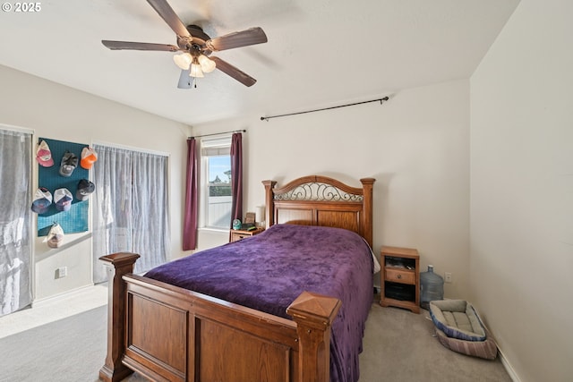 302 NW Elderberry Ln, Dallas, OR 97338 - carpeted bedroom featuring a ceiling fan and baseboards