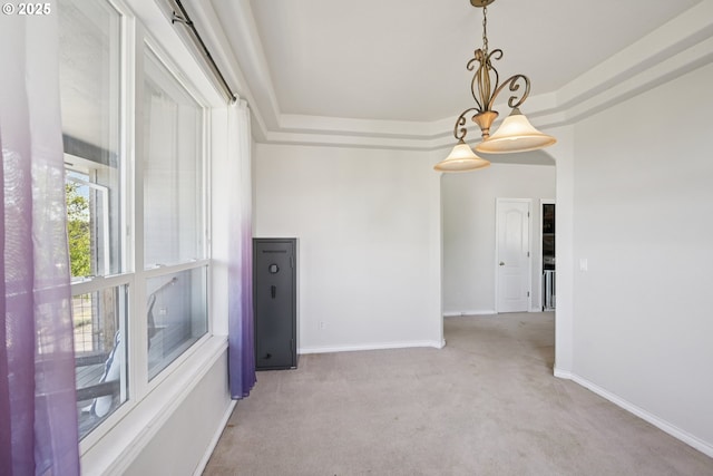 302 NW Elderberry Ln, Dallas, OR 97338 - carpeted empty room featuring a tray ceiling and baseboards