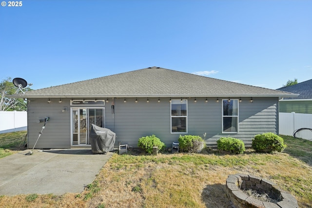 302 NW Elderberry Ln, Dallas, OR 97338 - rear view of property featuring a fire pit and a patio