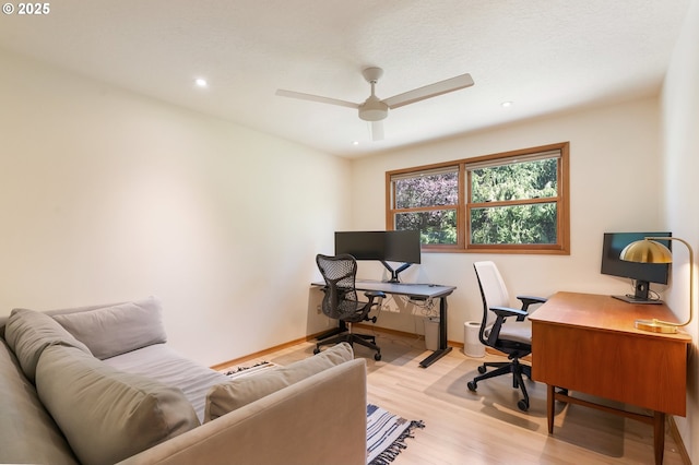 office area with a ceiling fan, light wood-style floors, recessed lighting, and baseboards