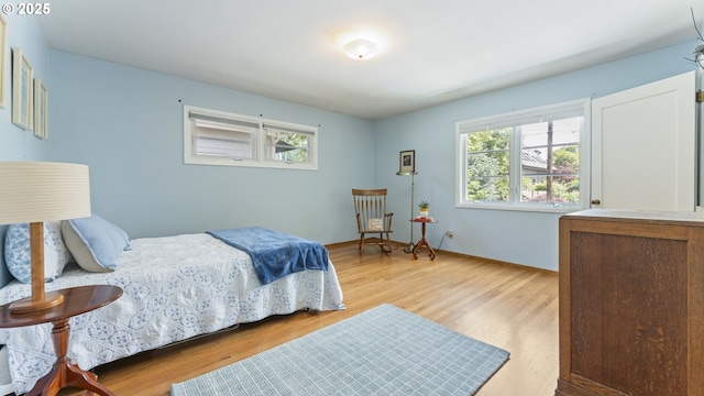 4217 NE 19th Ave, Portland, OR 97211 - bedroom featuring light wood-type flooring