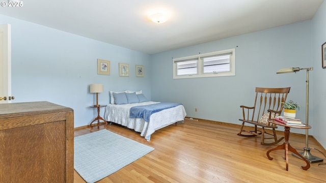 4217 NE 19th Ave, Portland, OR 97211 - bedroom with light wood finished floors and baseboards
