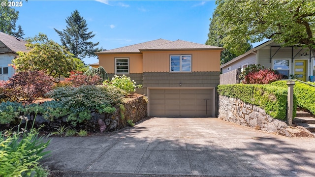 4217 NE 19th Ave, Portland, OR 97211 - view of front of property featuring concrete driveway and a garage