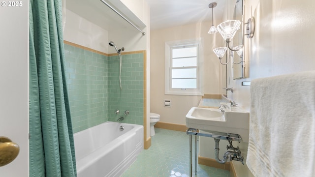 4217 NE 19th Ave, Portland, OR 97211 - bathroom featuring shower / bathtub combination with curtain and tile patterned flooring