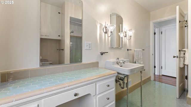 4217 NE 19th Ave, Portland, OR 97211 - full bathroom with baseboards and decorative backsplash