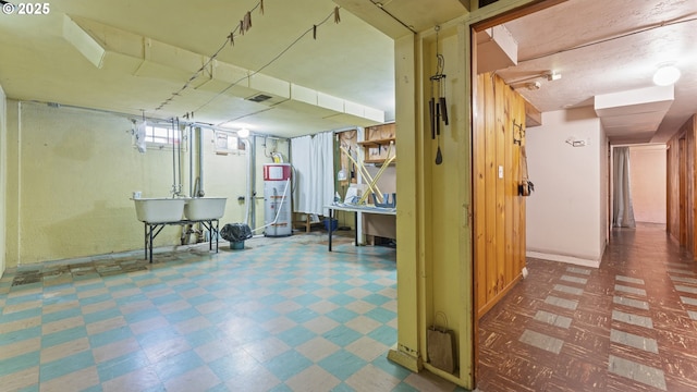4217 NE 19th Ave, Portland, OR 97211 - basement with gas water heater and tile patterned floors