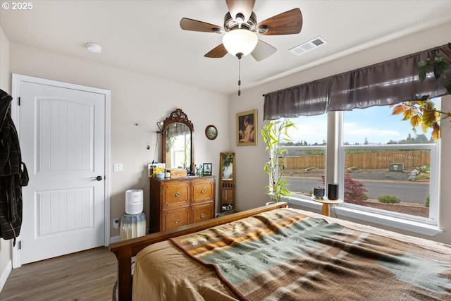 bedroom with wood finished floors