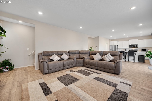 4829 Surveyor Ave, Salem, OR 97305 - living room with light wood-style flooring, recessed lighting, and baseboards