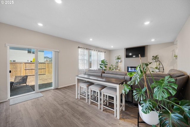 4829 Surveyor Ave, Salem, OR 97305 - living room with wood finished floors, recessed lighting, baseboards, and a glass covered fireplace