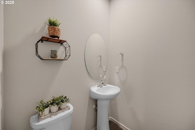 4829 Surveyor Ave, Salem, OR 97305 - bathroom with toilet, wood finished floors, and a sink
