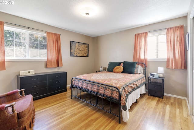 bedroom featuring light hardwood / wood-style floors