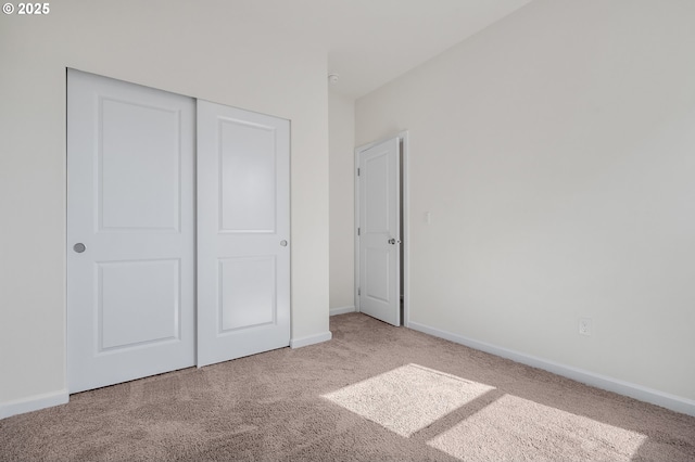1712 W 12th St, La Center, WA 98629 - unfurnished bedroom with carpet, baseboards, and a closet
