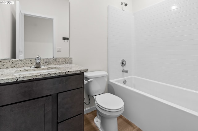 1712 W 12th St, La Center, WA 98629 - bathroom featuring wood finished floors, vanity, toilet, and shower / bathtub combination