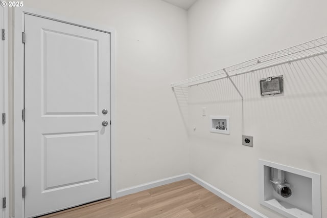 1712 W 12th St, La Center, WA 98629 - laundry area featuring hookup for an electric dryer, washer hookup, light wood-type flooring, baseboards, and gas dryer hookup