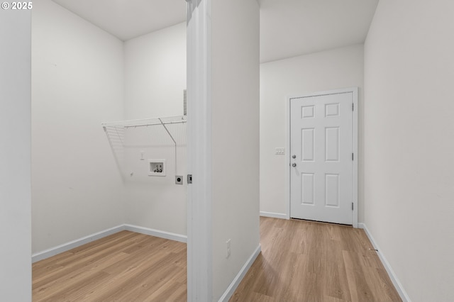 1712 W 12th St, La Center, WA 98629 - laundry room with washer hookup, wood finished floors, hookup for an electric dryer, and baseboards
