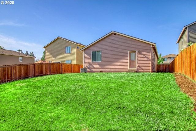 1712 W 12th St, La Center, WA 98629 - back of property with central air condition unit, crawl space, and entry steps