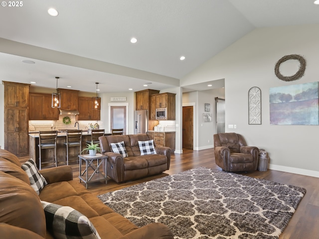 29349 SE Sunview Ln, Estacada, OR 97023 - living room featuring lofted ceiling, dark wood-style floors, baseboards, and recessed lighting