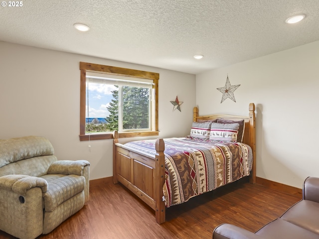 29349 SE Sunview Ln, Estacada, OR 97023 - bedroom featuring wood finished floors, baseboards, a textured ceiling, and recessed lighting
