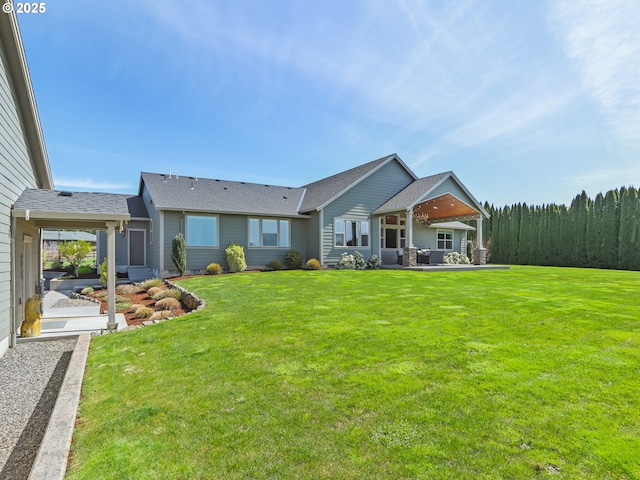 29349 SE Sunview Ln, Estacada, OR 97023 - rear view of house featuring a yard, a patio, and a shingled roof