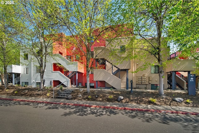 view of front of house with stairs