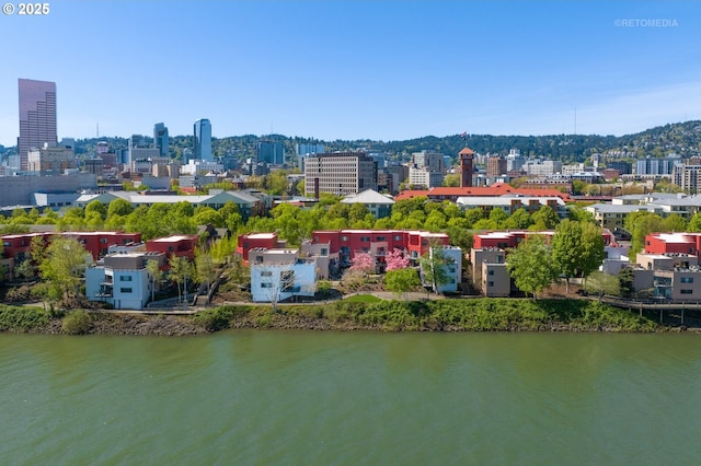 drone / aerial view featuring a water view