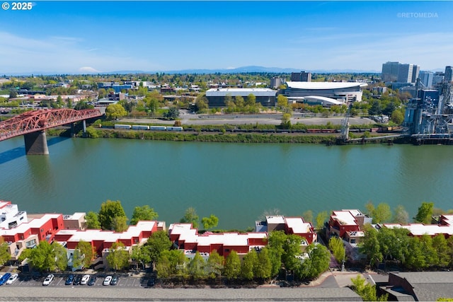 drone / aerial view with a water view