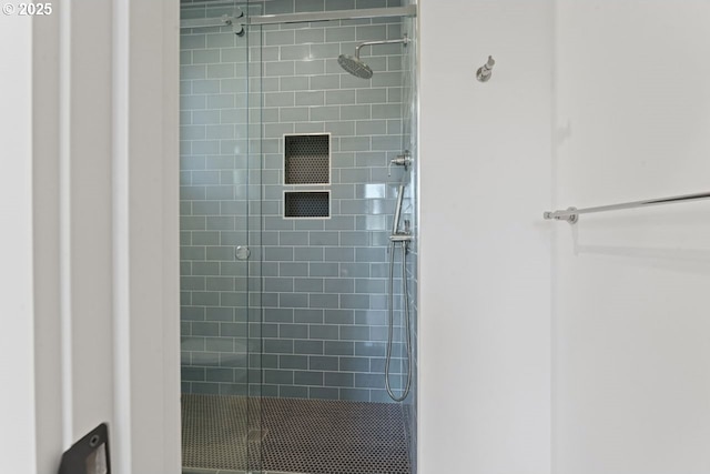 bathroom with an enclosed shower