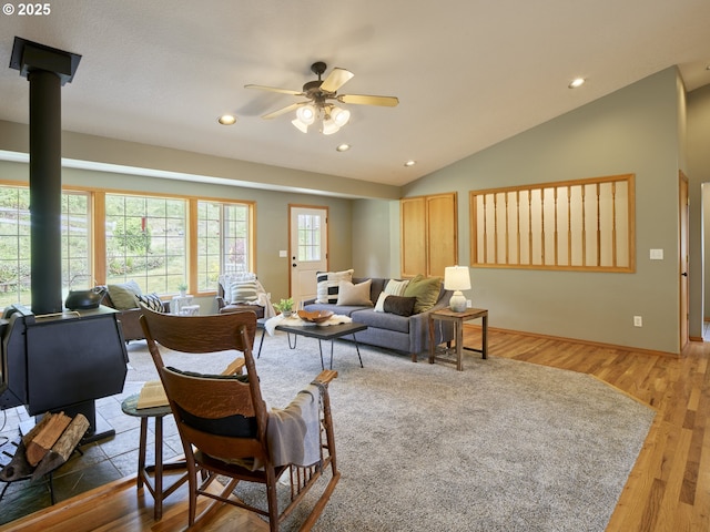 13708 NE 401st Way, Amboy, WA 98601 - living area with a wood stove, a ceiling fan, light wood finished floors, recessed lighting, and lofted ceiling