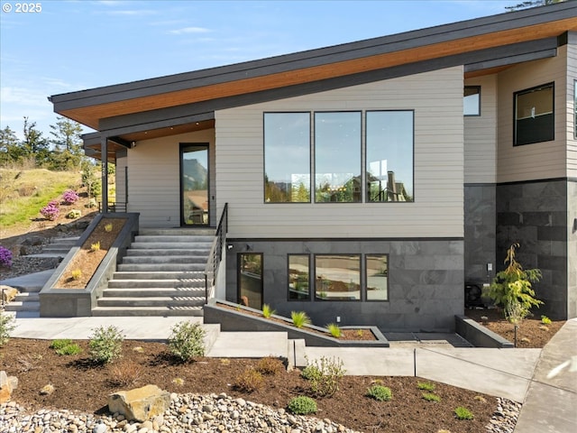 725 NW Angel Heights Rd, Stevenson, WA 98648 - rear view of house featuring stairway