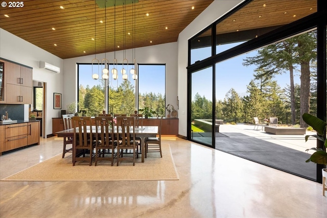 725 NW Angel Heights Rd, Stevenson, WA 98648 - dining space with vaulted ceiling, plenty of natural light, a wall unit AC, and wooden ceiling