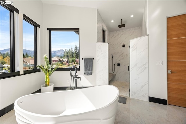 725 NW Angel Heights Rd, Stevenson, WA 98648 - bathroom with recessed lighting, a mountain view, a marble finish shower, and plenty of natural light