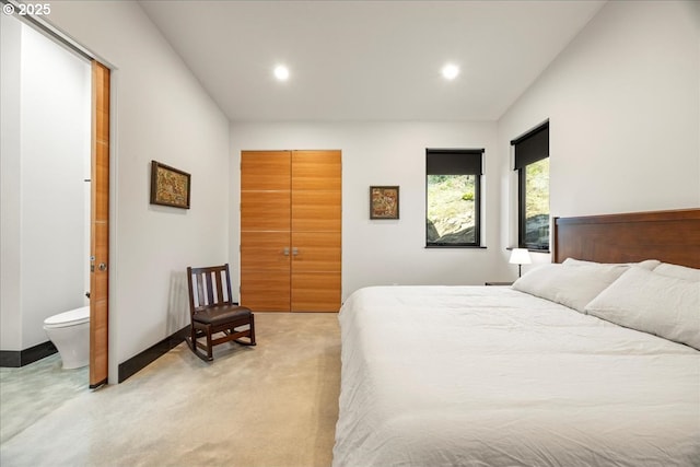 725 NW Angel Heights Rd, Stevenson, WA 98648 - bedroom featuring recessed lighting, a closet, and light colored carpet