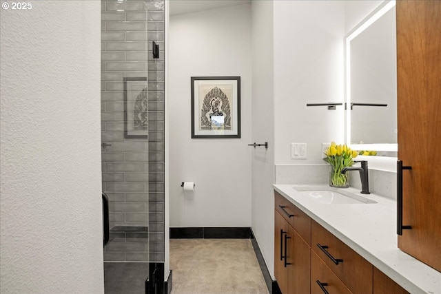 725 NW Angel Heights Rd, Stevenson, WA 98648 - full bath featuring baseboards, vanity, and a stall shower