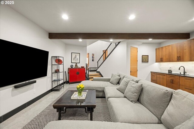 725 NW Angel Heights Rd, Stevenson, WA 98648 - living room with beam ceiling, baseboards, recessed lighting, light colored carpet, and stairs