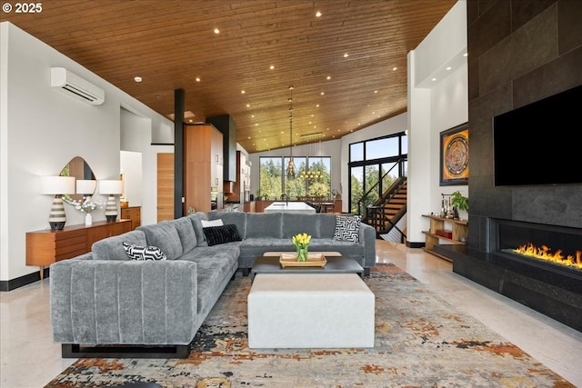 725 NW Angel Heights Rd, Stevenson, WA 98648 - living room with wood ceiling, recessed lighting, and a wall mounted air conditioner