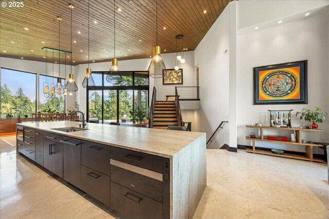 725 NW Angel Heights Rd, Stevenson, WA 98648 - kitchen with a sink, a spacious island, recessed lighting, modern cabinets, and wooden ceiling