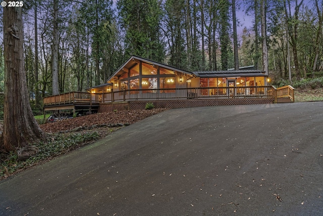 view of front of home with a deck