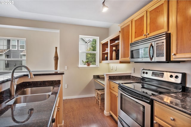 525 Springtree Ln, West Linn, OR 97068 - kitchen with appliances with stainless steel finishes, wood finished floors, dark stone counters, and open shelves