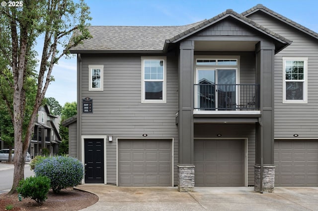 525 Springtree Ln, West Linn, OR 97068 - view of property featuring a garage, a balcony, and driveway