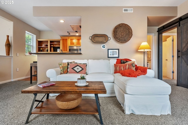 525 Springtree Ln, West Linn, OR 97068 - carpeted living room with a barn door and rail lighting