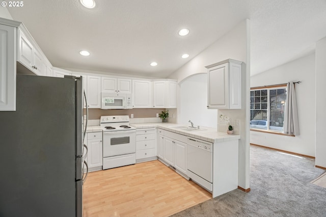 5661 J St, Washougal, WA 98671 - kitchen featuring white appliances, recessed lighting, a sink, white cabinetry, and tile countertops